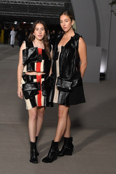 Alana and Este Haim wear Louis Vuitton at the Academy Museum Gala 2022.