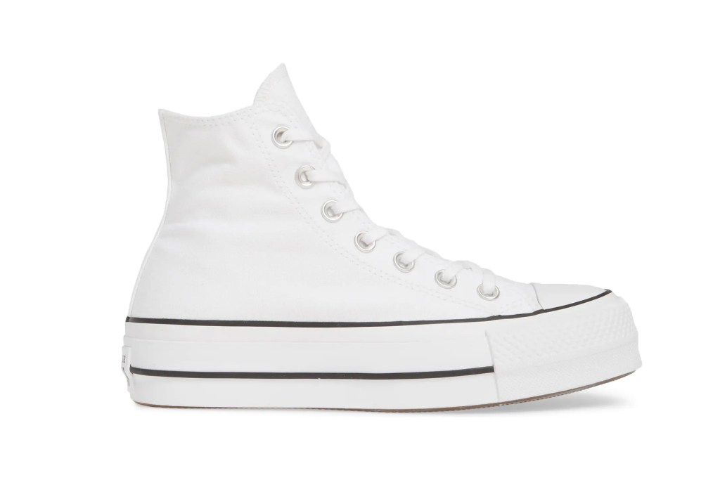 A white high top Converse sneaker