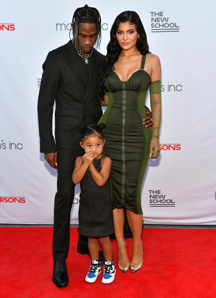 Kylie Jenner, Travis Scott and Stormi Webster on the red carpet.