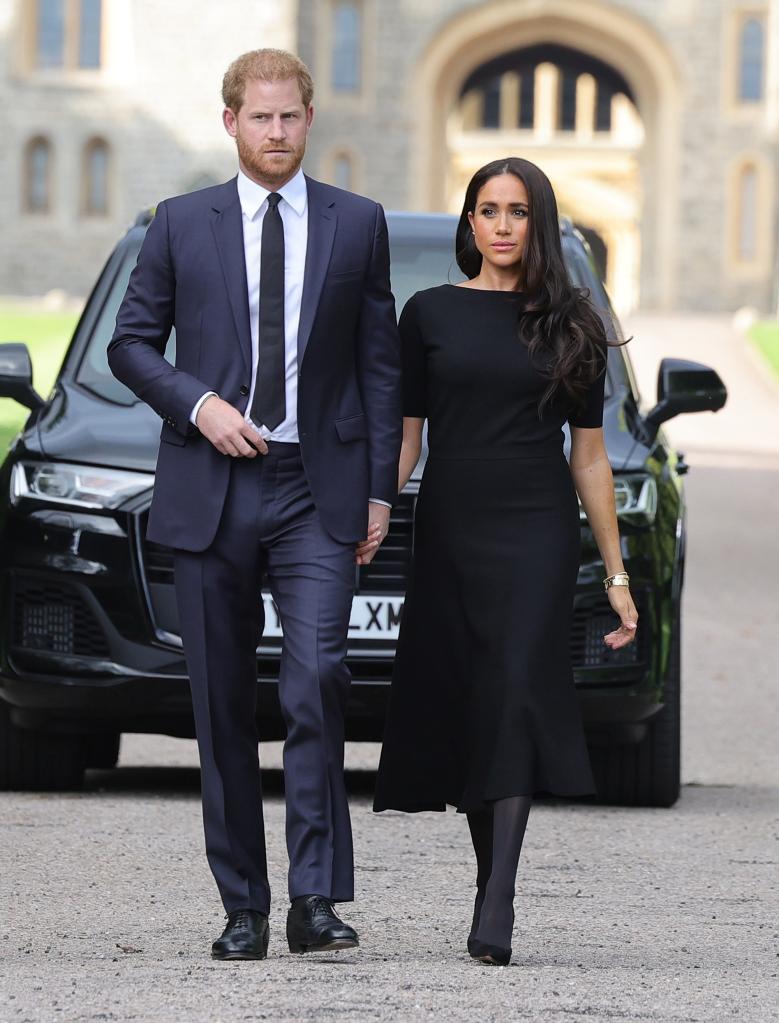 Harry and Meghan Markle walking hand in hand