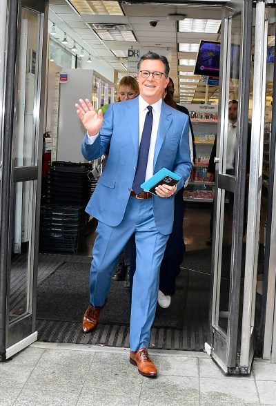 Stephen Colbert exiting Duane Reade