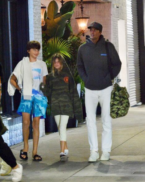 Tom Brady with his kids Vivian and Benjamin at the movies.