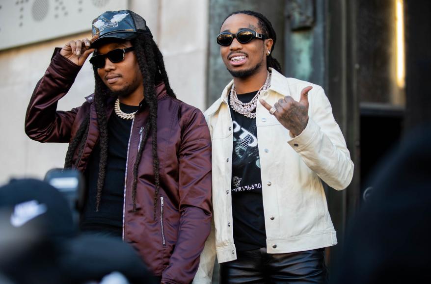 Takeoff and Quavo walking together.