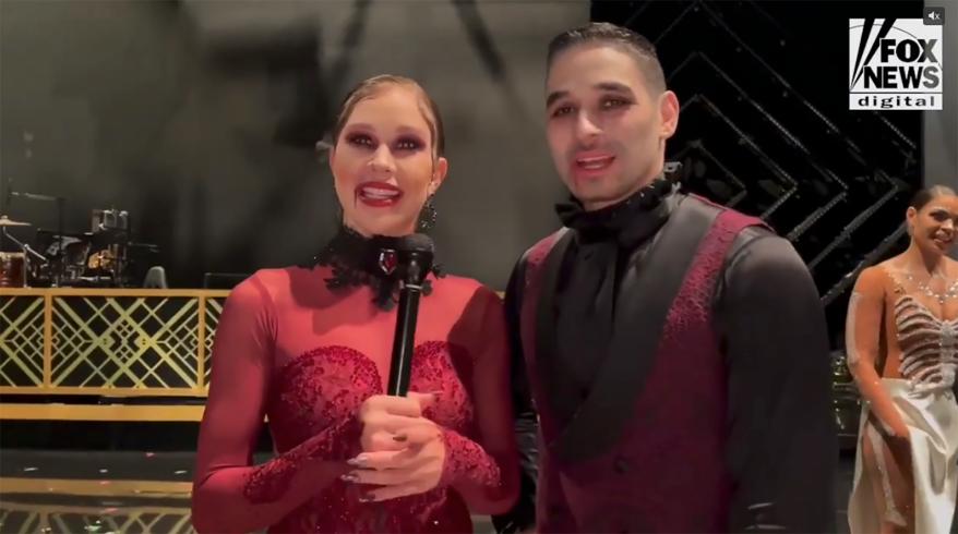 Gabby Windey and Alan Bersten talking in an interview for "Dancing With the Stars."