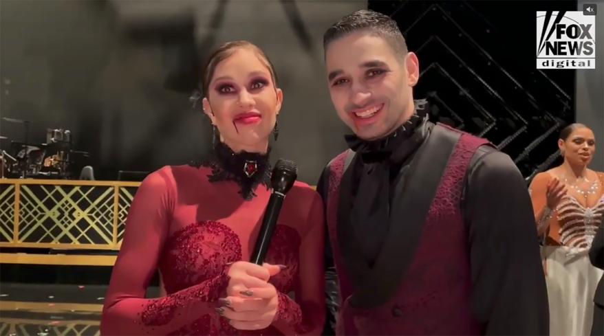 Gabby Windey and Alan Bersten talking in an interview for "Dancing With the Stars."