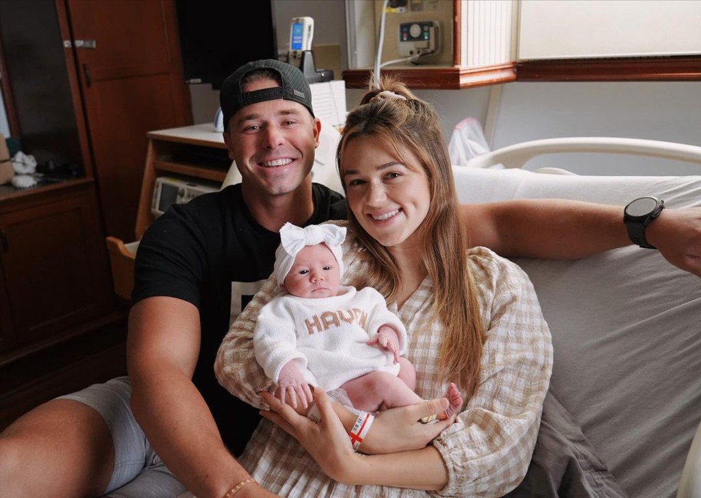 Sadie Robertson and Christian Huff with their baby.