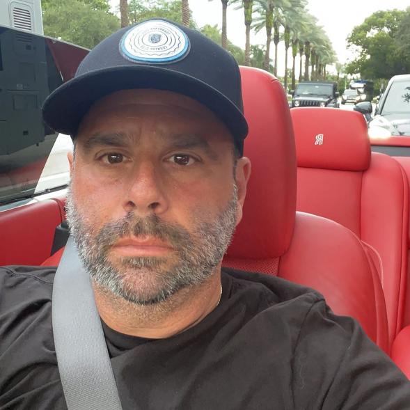 A selfie of Randall Emmett in a car.