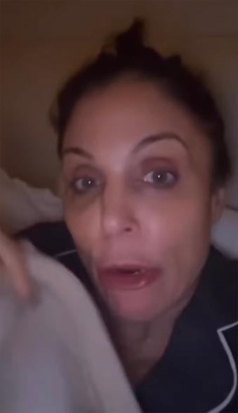 A screenshot of Bethenny Frankel talking in bed in an Instagram video.