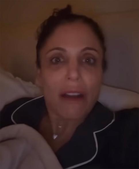 A screenshot of Bethenny Frankel talking in bed in an Instagram video.