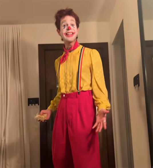 Jesse Rutherford wearing a clown costume for Halloween.