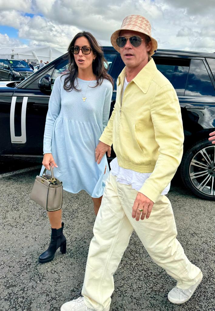 Ines de Ramon and Brad Pitt holding hands in 2024. 