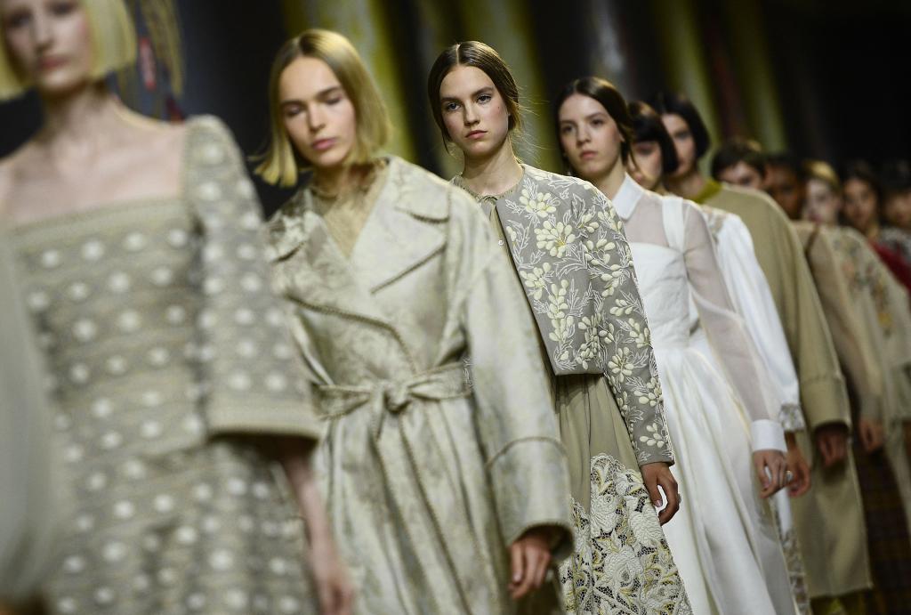 Models showing jackets on the catwalk for the Christian Dior Women's haute couture Fall - Winter 2023 collection during a fashion show as part of Fashion Week in Paris in July 2022.