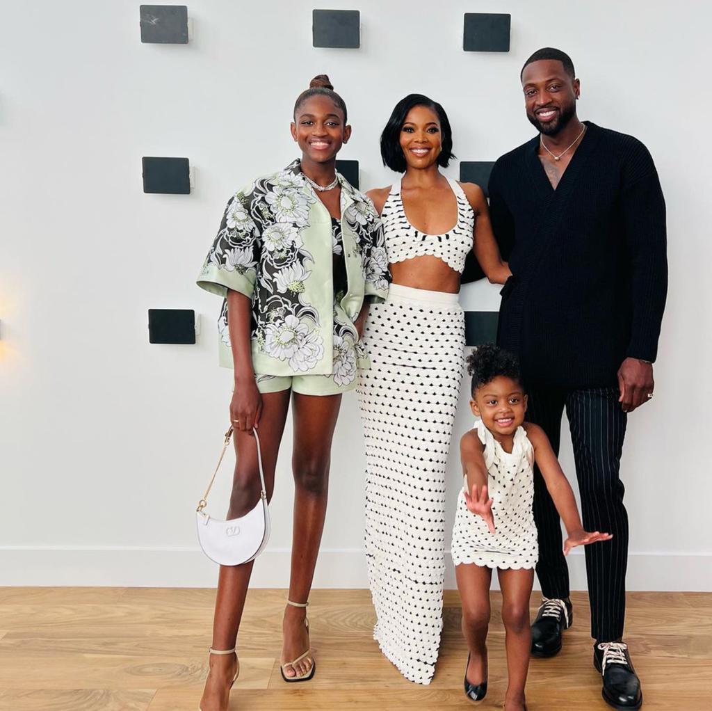 A photo of Dwyande Wade, Gabrielle Union and their daughters Zaya and Kaavia.