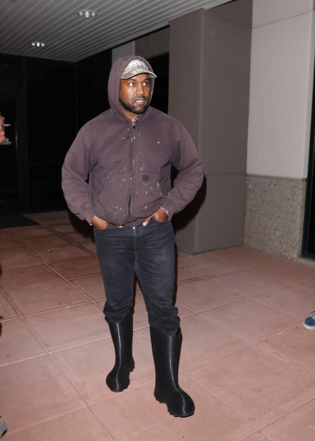 Kanye West walking.