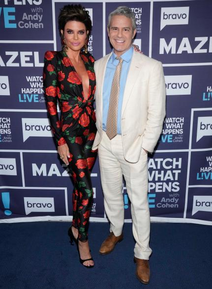 Lisa Rinna and Andy Cohen posing together at "Watch What Happens Live."