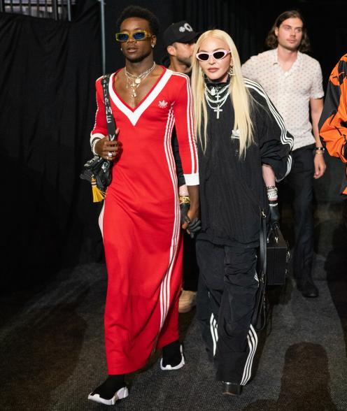 David Banda and Madonna walking together.