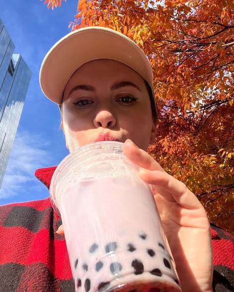 Ireland Baldwin sips a boba tea.