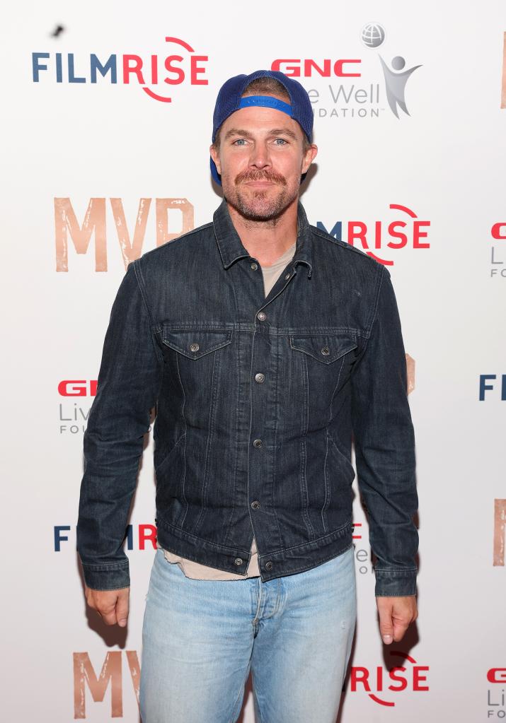 Stephen Amell on a red carpet.