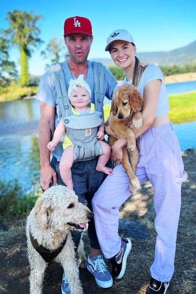 Zachary Ty Bryan and fianceé Johnnie Faye with their dog and baby.