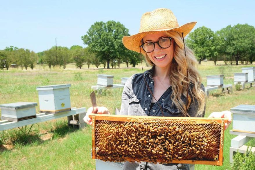Texas beekeeper Erika Thompson with bees.