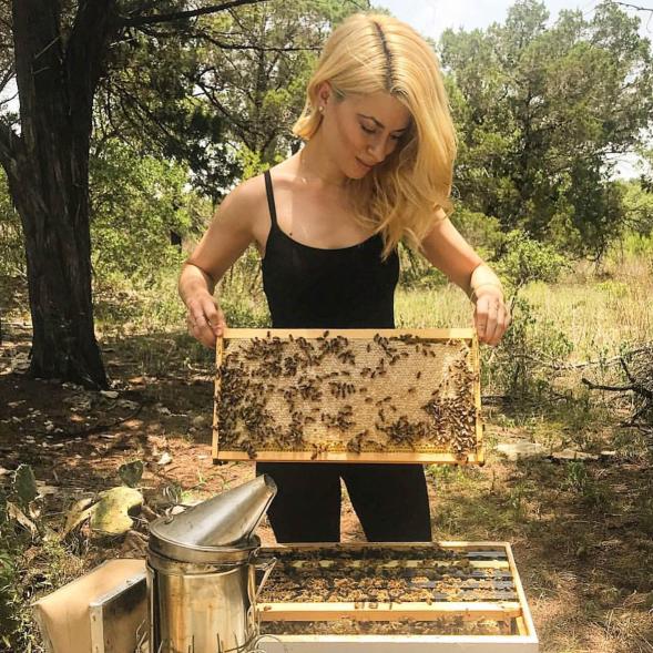 Texas beekeeper Erika Thompson with bees.