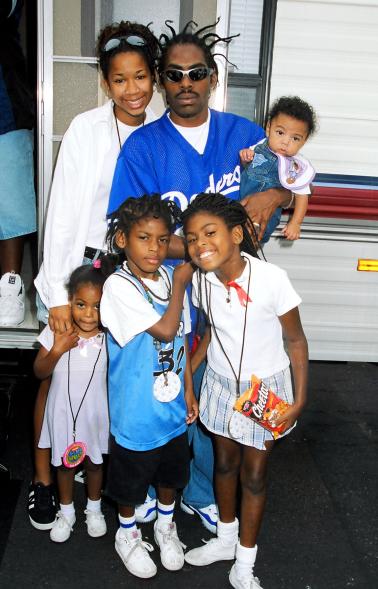 Coolio posing with his children.