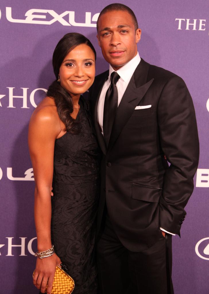 T.J. Holmes and Marilee Fiebig on a red carpet.