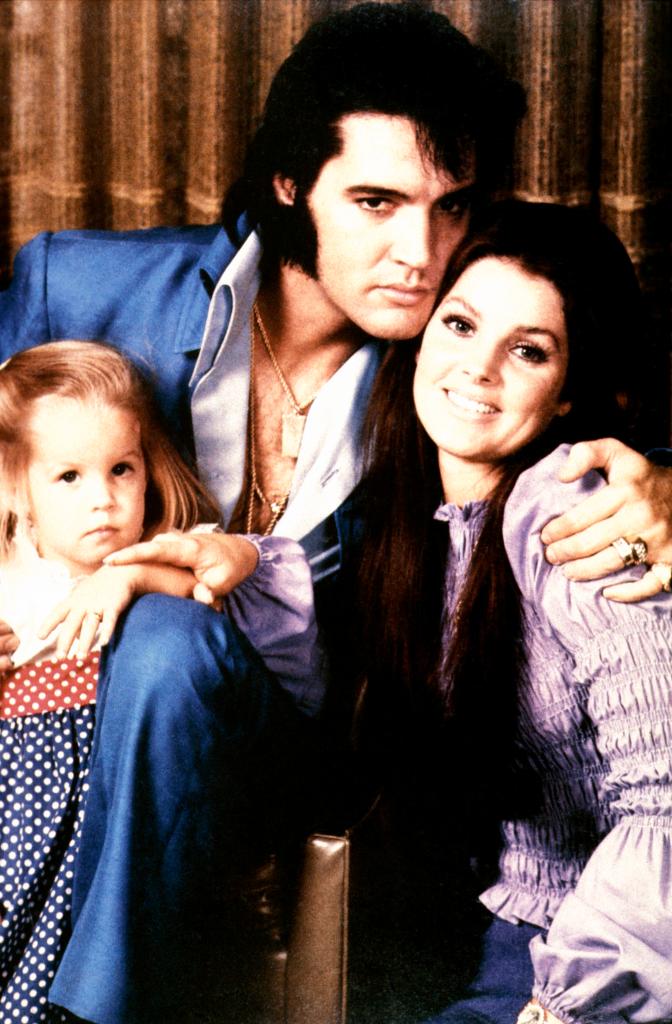 A family photo of Elvis, Lisa Marie and Priscilla Presley.