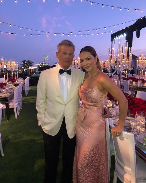 Katherine McPhee and David Foster posing for a photo at a party.