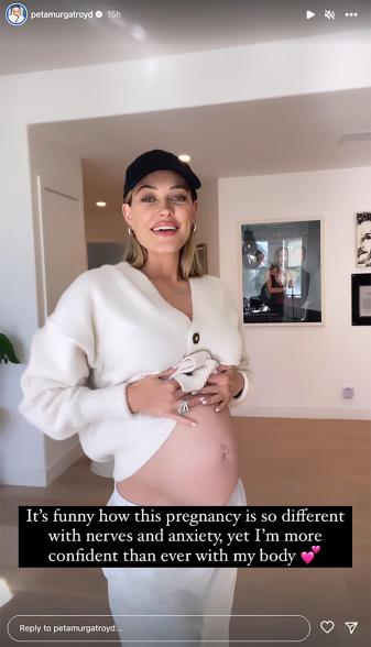 Peta Murgatroyd showing her growing baby bump.