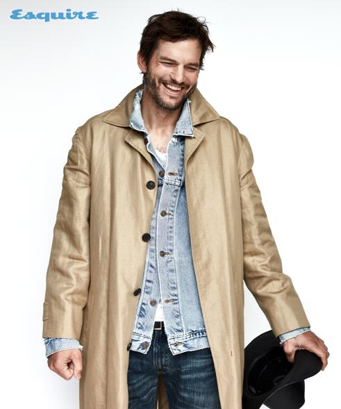 Ashton Kutcher poses for "Esquire" in denim jacket and trenchcoat