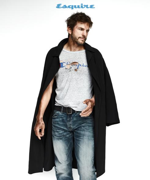 Ashton Kutcher poses for "Esquire" in tee shirt and black jacket