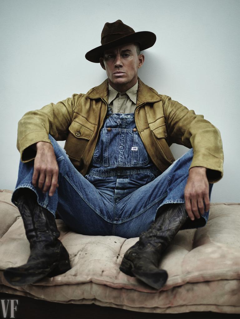 Channing Tatum poses in hat and overalls