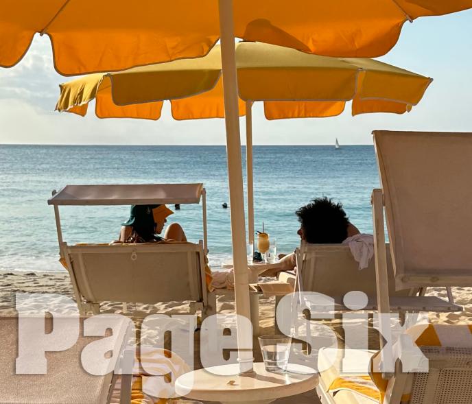 Emily Ratajkowski and Eric André on the beach on Grand Cayman