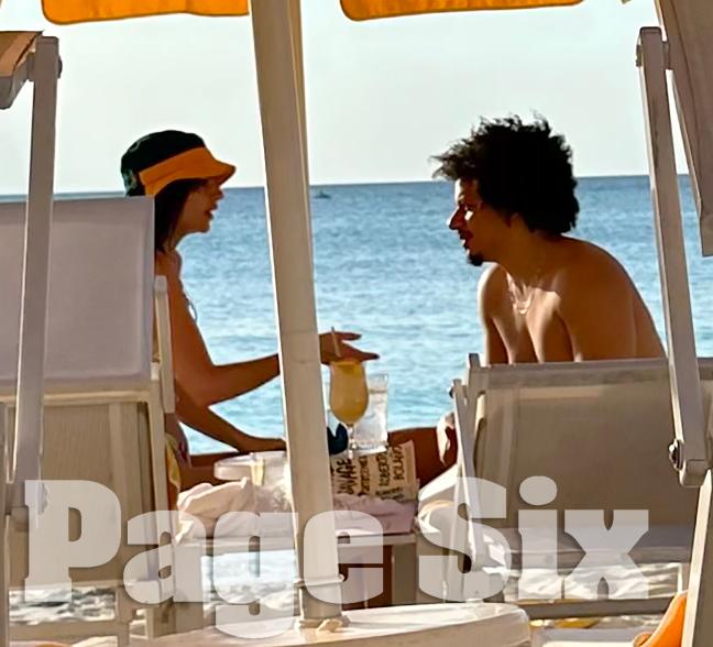 Emily Ratajkowski and Eric André on the beach on Grand Cayman