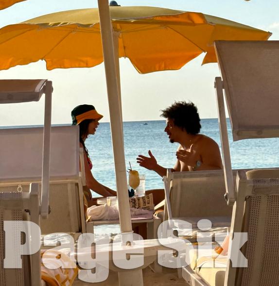 Emily Ratajkowski and Eric André on the beach on Grand Cayman