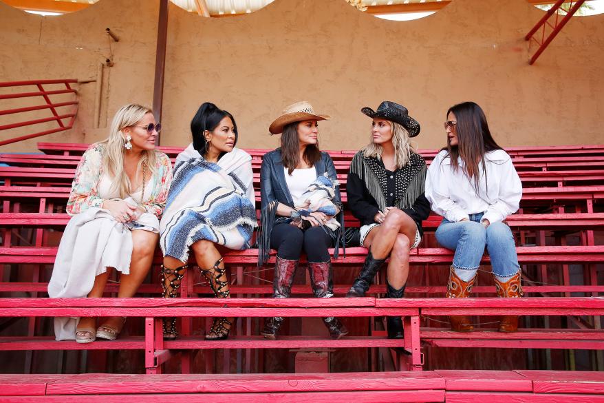 Jen Shah, Whitney Rose, Heather Gay, Lisa Barlow and Meredith Marks talking while filming "RHOSLC"