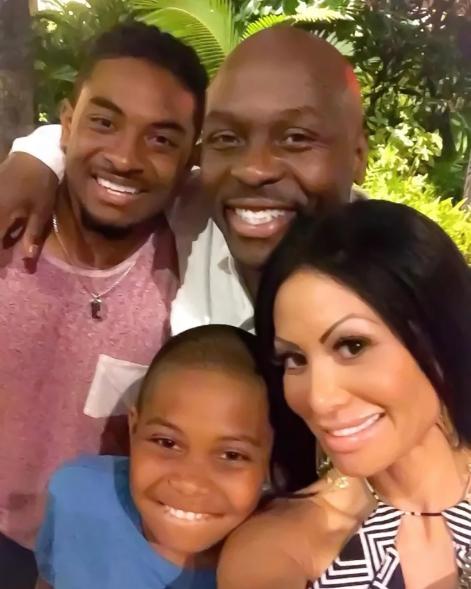 Jen Shah posing for a selfie with her husband and sons