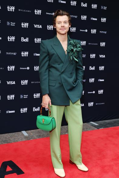 Harry Styles sports head-to-toe green on red carpet