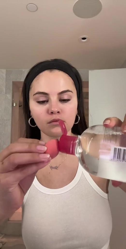 Selena Gomez doing a skincare video.