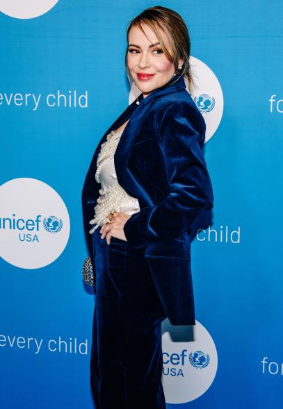 Alyssa Milano on the red carpet of an event.