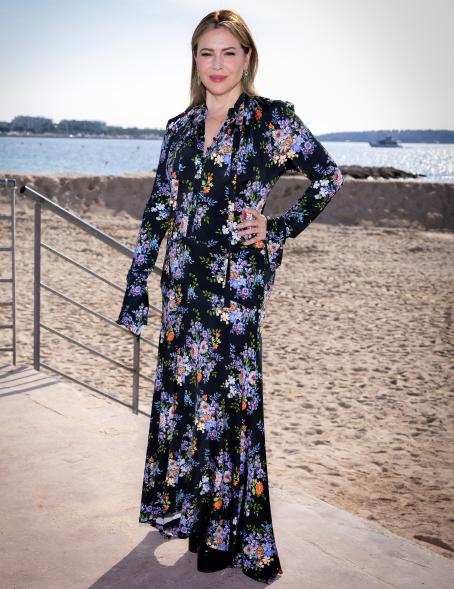 Alyssa Milano at the beach for an event.