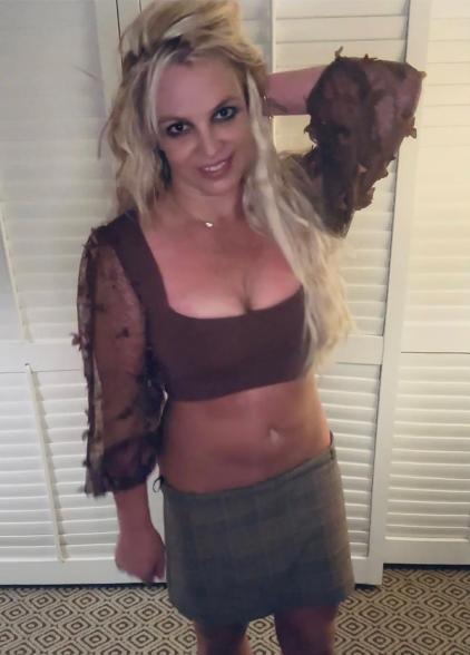 Britney Spears smiling in her house.