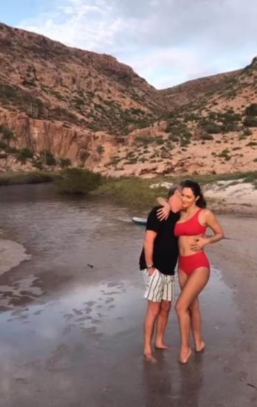 David Foster kisses Katharine McPhee in red bikini on beach
