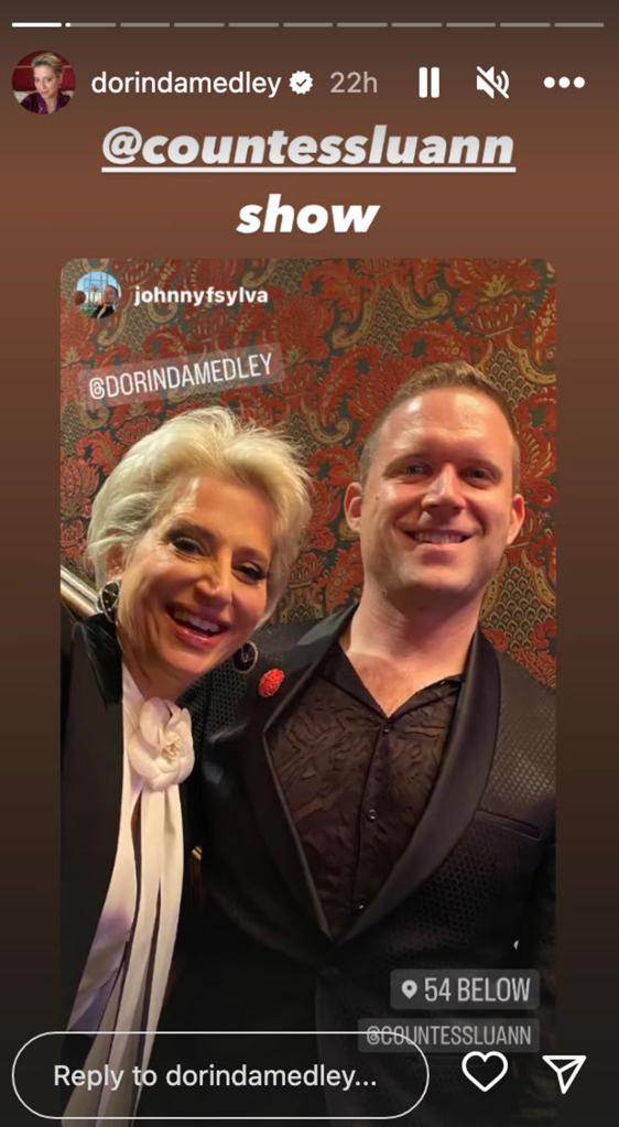 Dorinda Medley taking a photo with a fan at Luann de Lesseps' cabaret show.