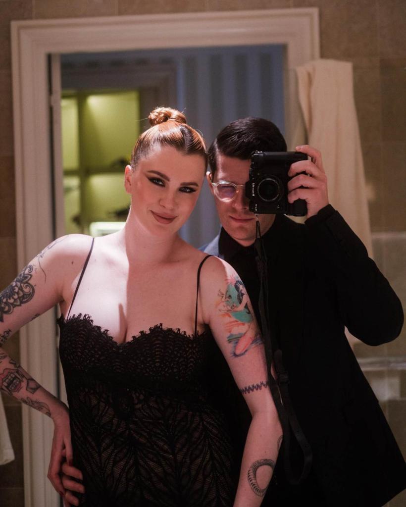 RAC taking a photo in a mirror with Ireland Baldwin.