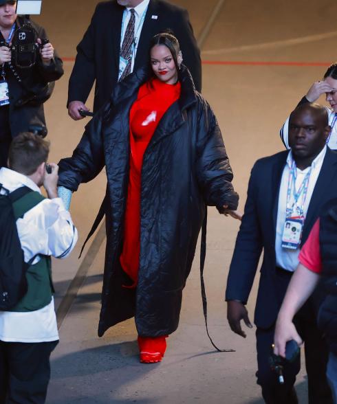 Rihanna walking in State Farm Stadium.