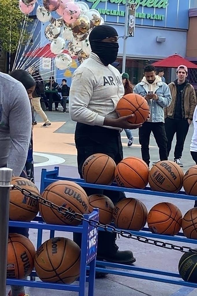 kanye west playing basketball at universal