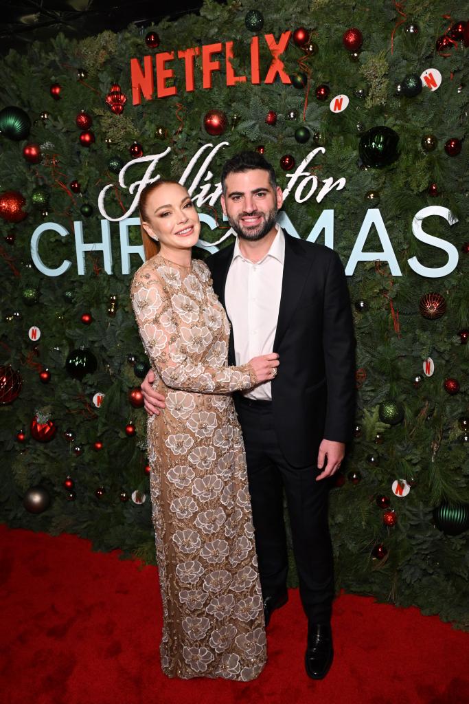 Lindsay Lohan and Bader Shammas on a red carpet.