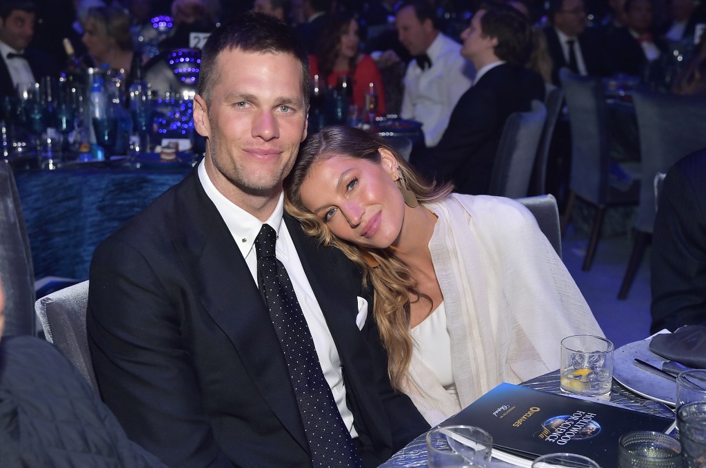 Gisele Bündchen leans on Tom Brady